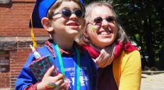 2022-2023 Policy Council Chair and her son in a graduation outfit