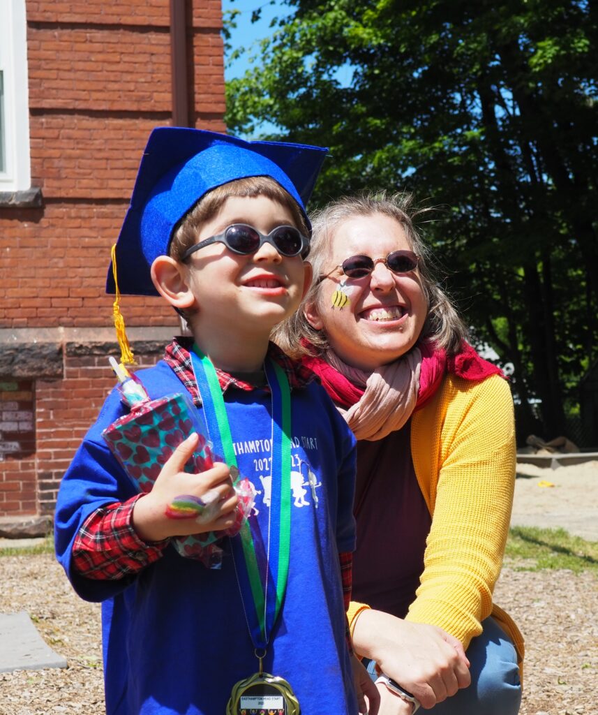 2022-2023 Policy Council Chair and her son in a graduation outfit